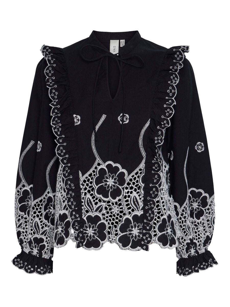 Black blouse with white embroidery