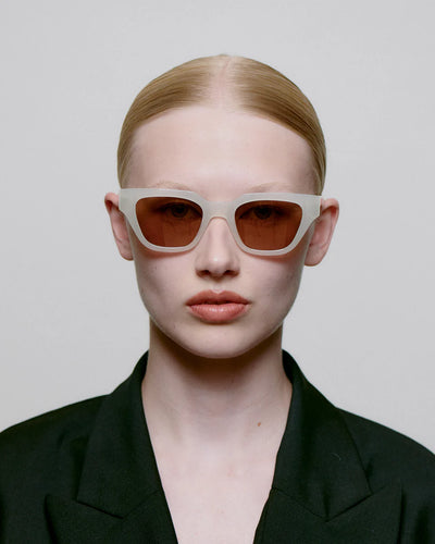 Kaws Cream Bone Sunglasses