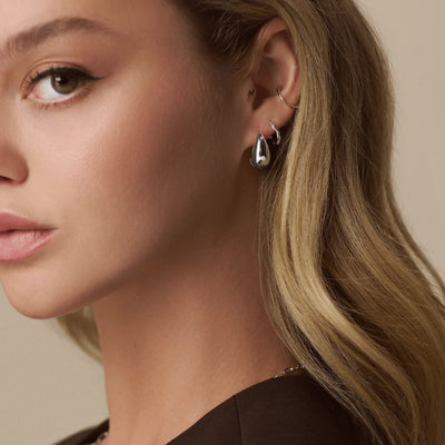 Polished Domed Taper Hoop Earrings Silver 31511